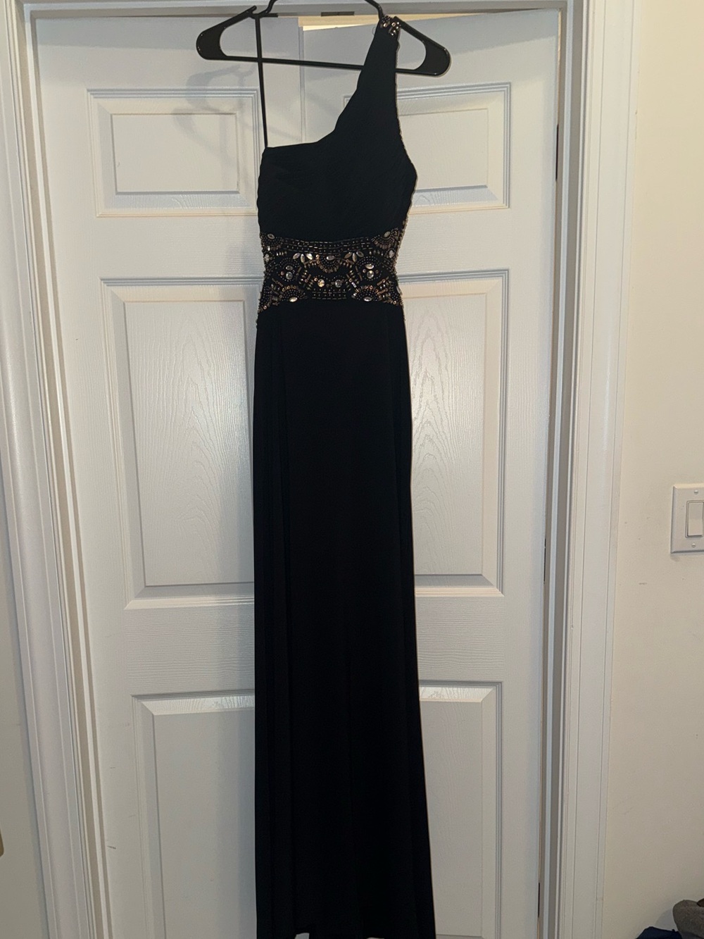 Black one shoulder beaded evening gown